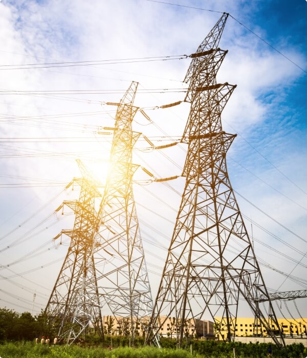 bynocgroup-sun-setting-silhouette-electricity-pylons